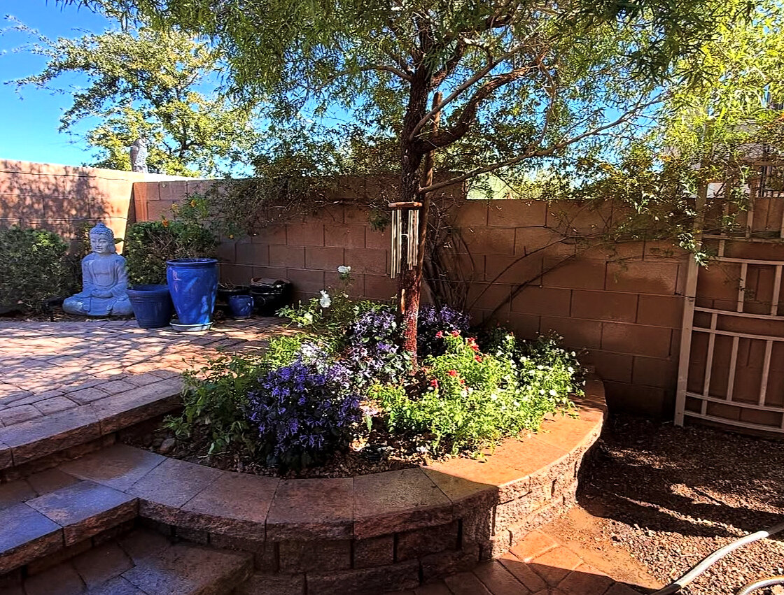 Backyard flower bed & paver patio