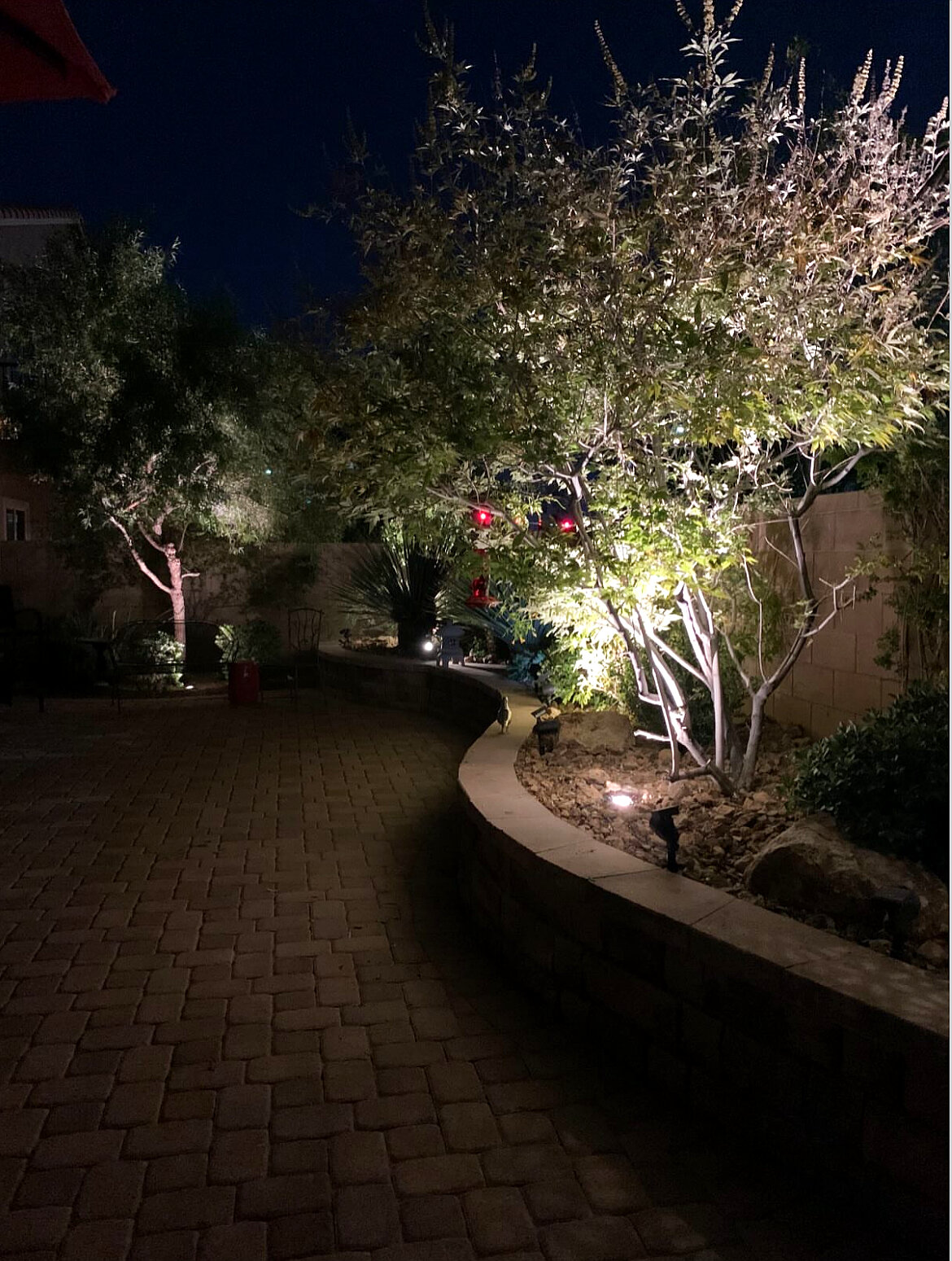 Night lighting along curved planter