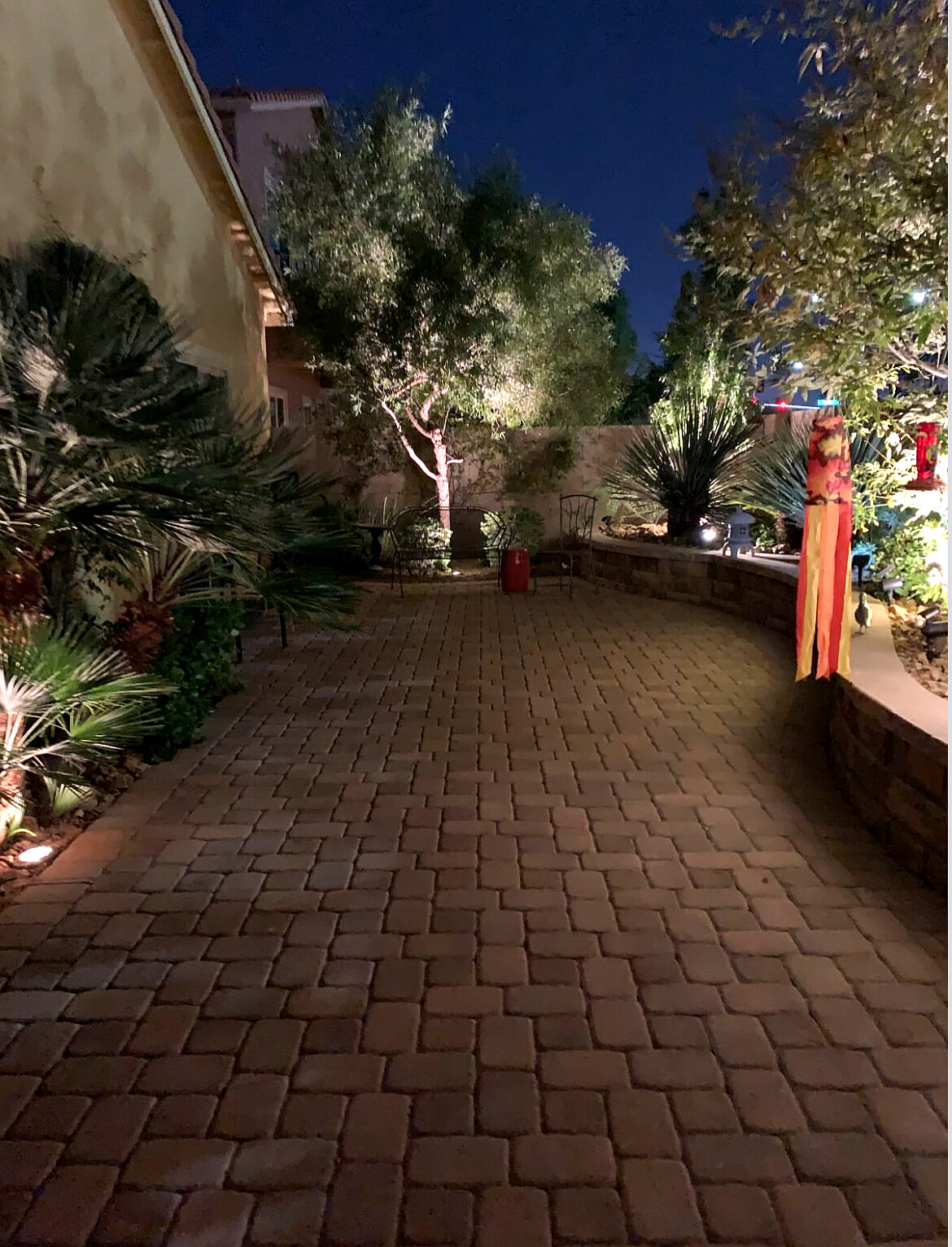 Completed paver patio at night